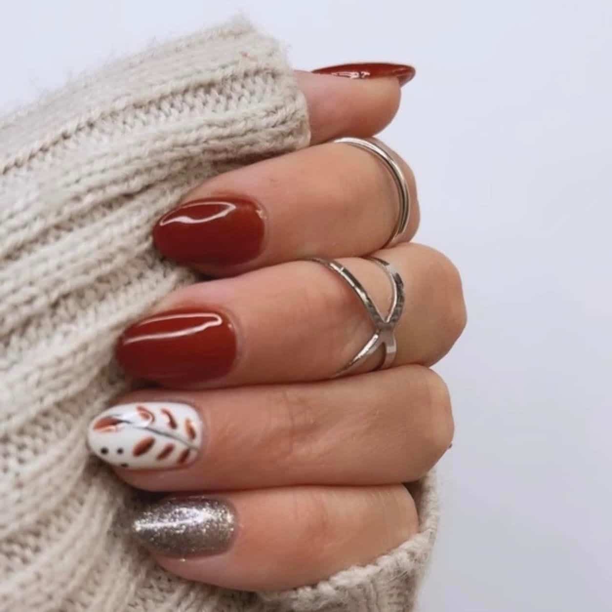 woman's hand showing off her red gelmmoment manicure